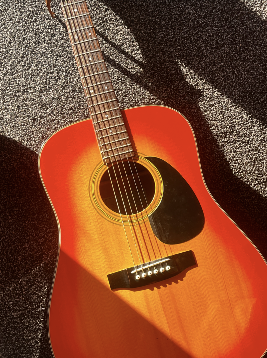 Sunburst acoustic guitar